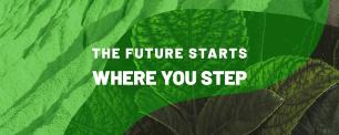 Green leaves with the text: "THE FUTURE STARTS WHERE YOU STEP"